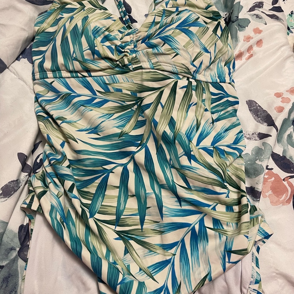 One piece swimming suit.